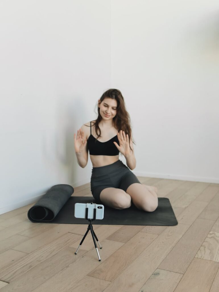 a woman recording her exercise